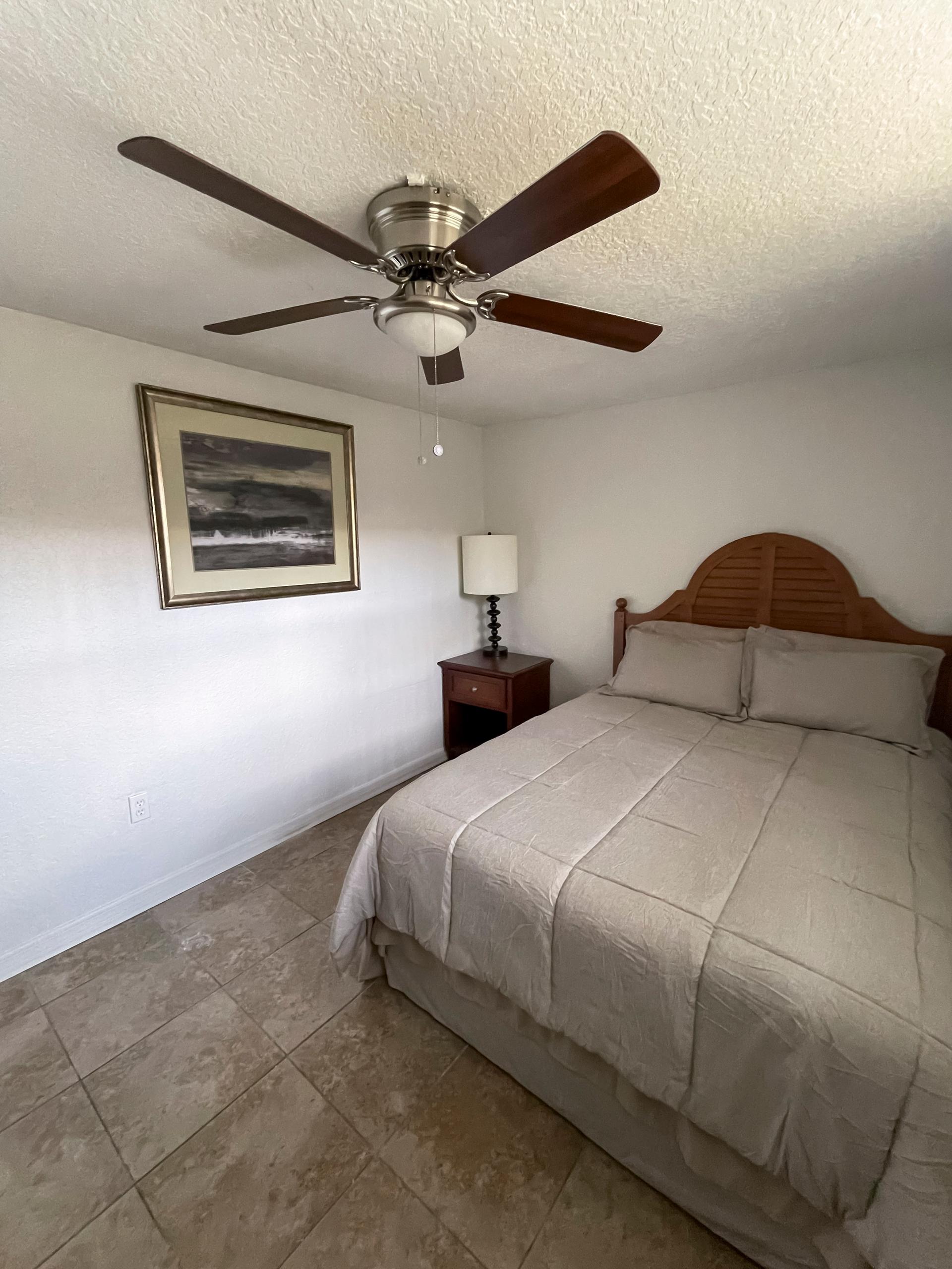 bedroom, detected:ceiling fan, window blind, bed
