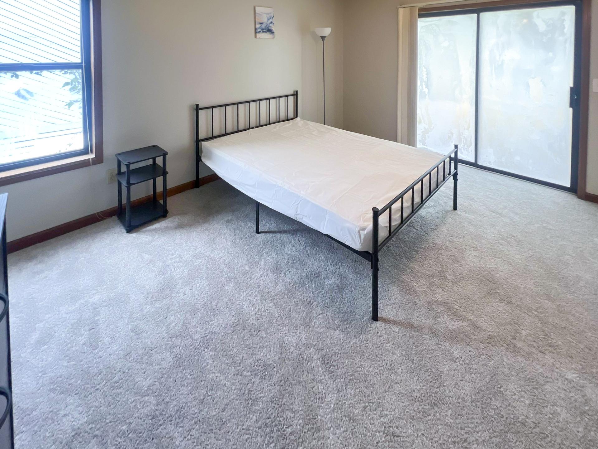 bedroom, detected:window blind, bed, ceiling fan