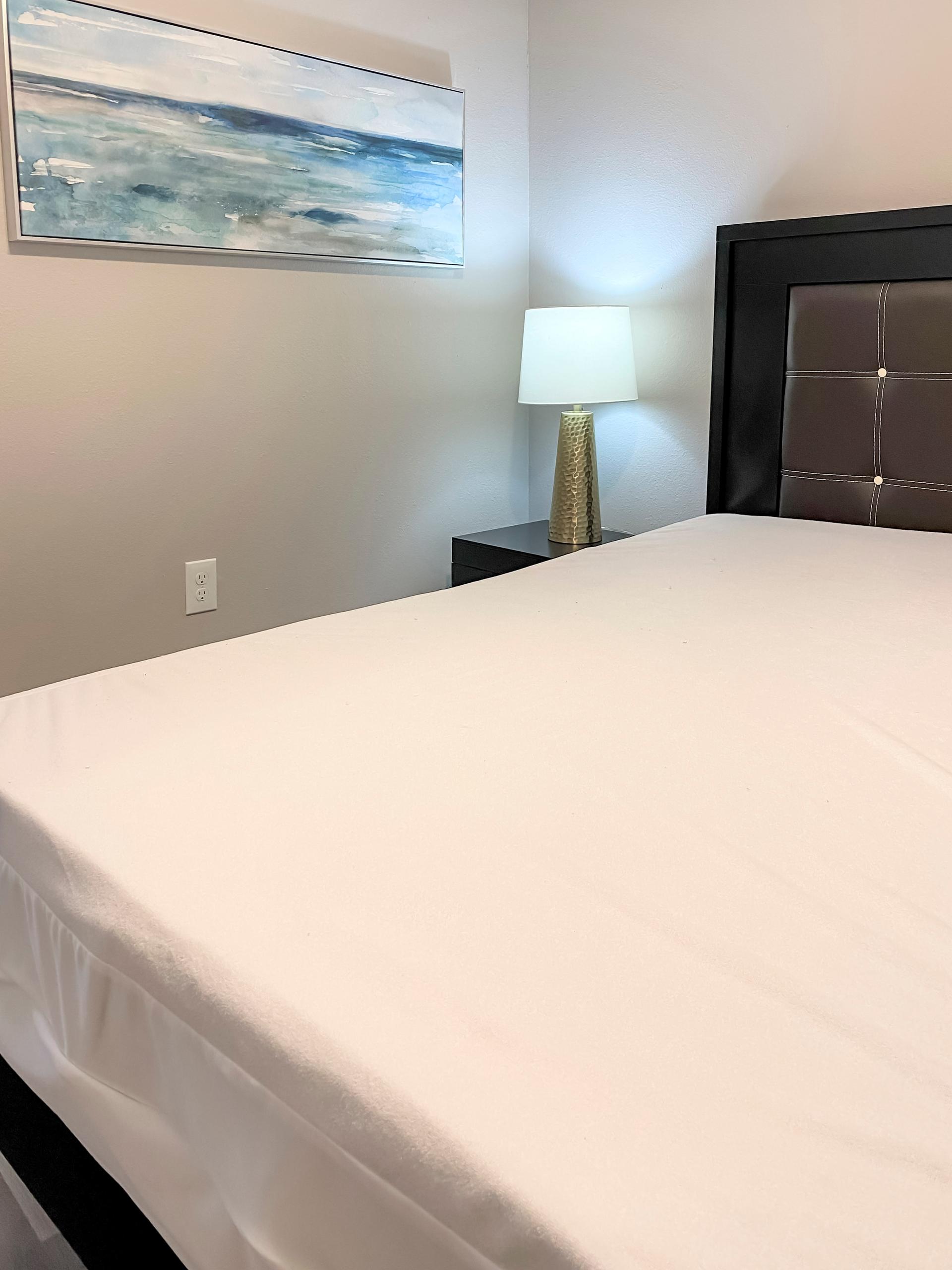 Bedroom 2 Side Table, Lamp and Wall Art