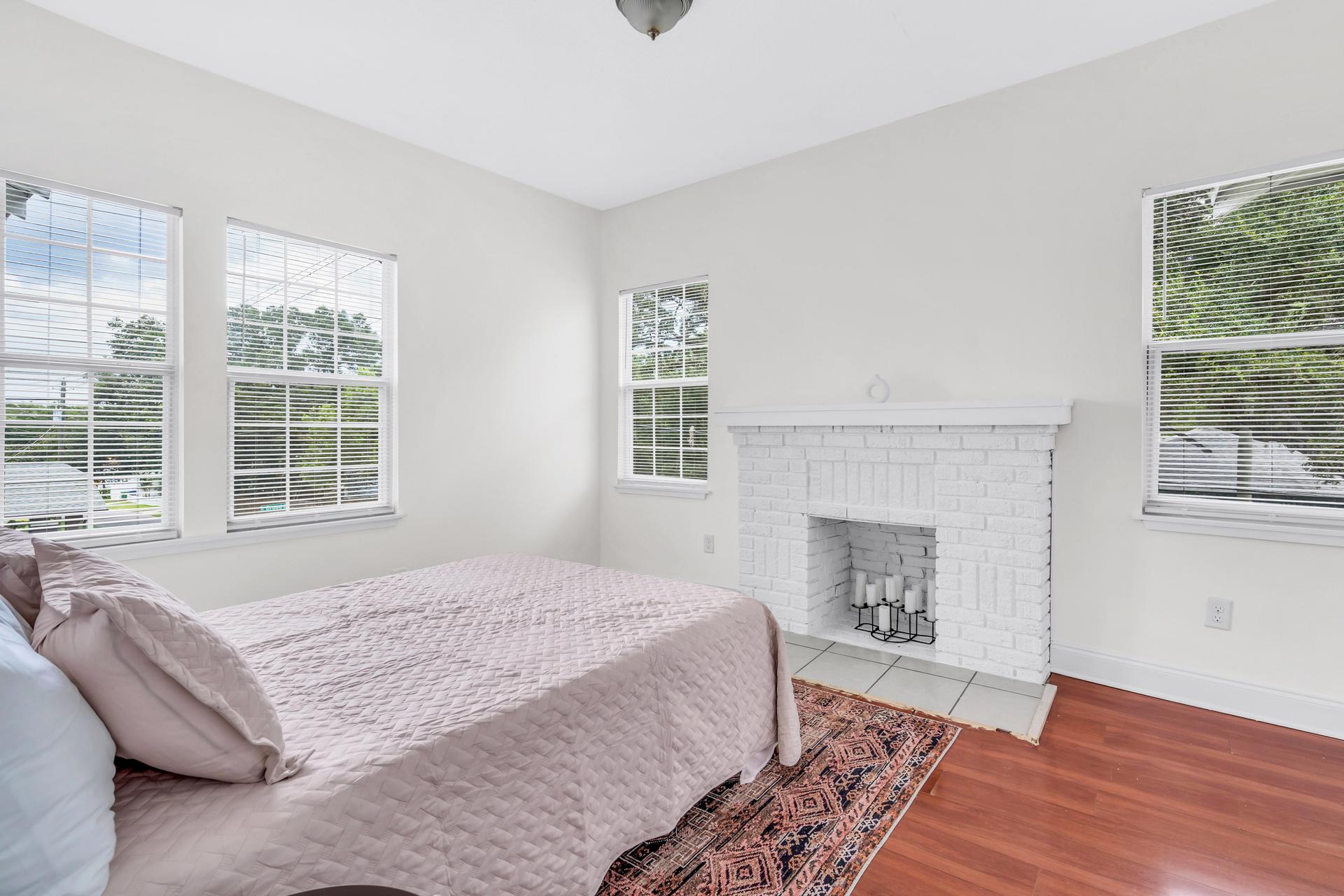 bedroom, detected:bed, window blind, ceiling fan