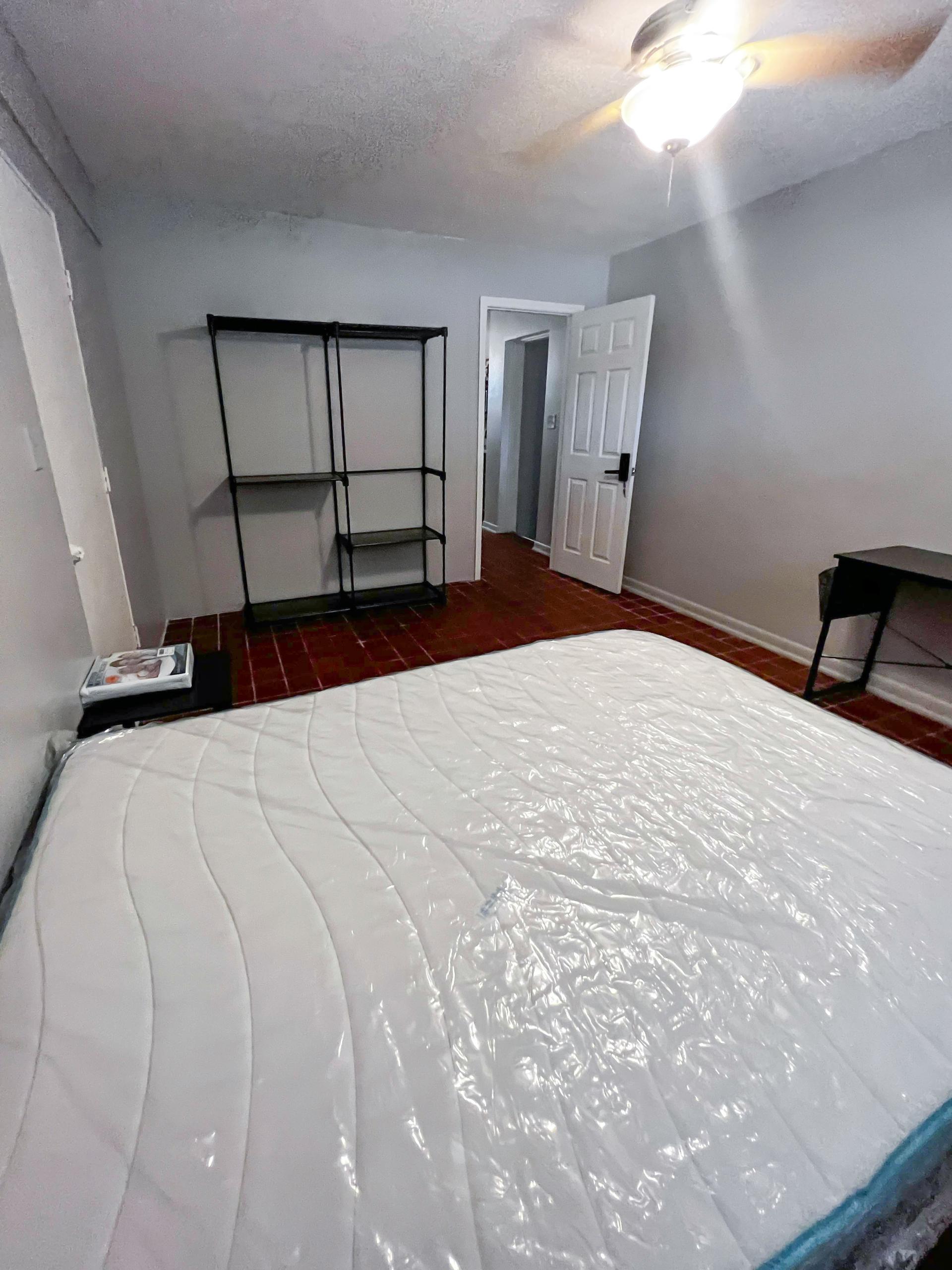 bedroom, detected:bed, ceiling fan, window blind