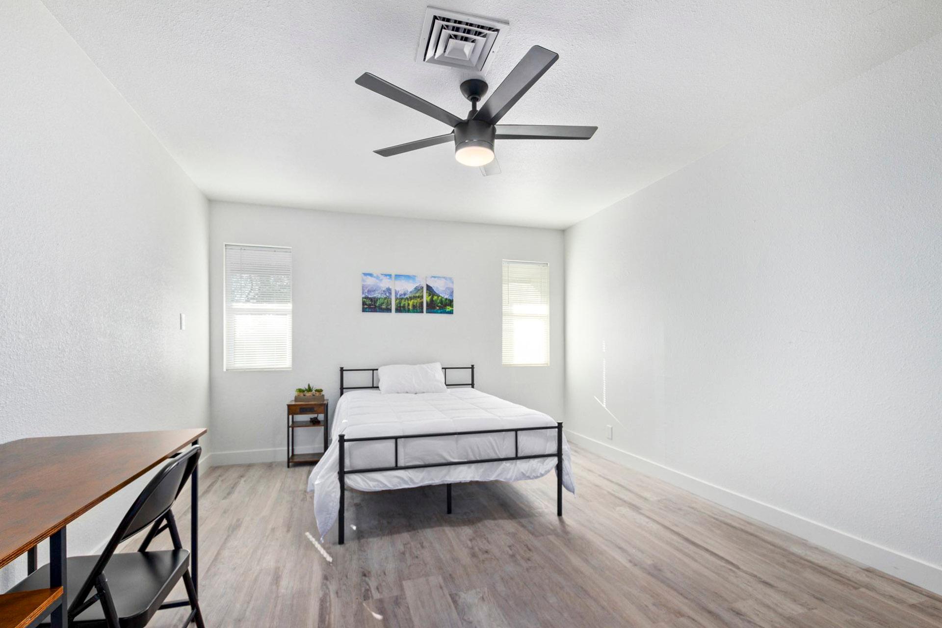bedroom, detected:ceiling fan, window blind, bed
