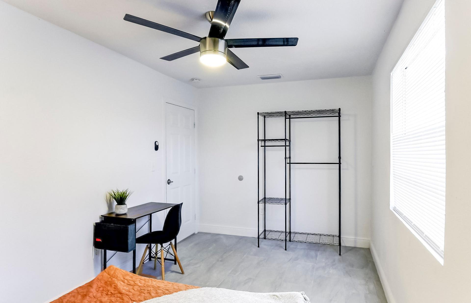 living_room, detected:ceiling fan, window blind