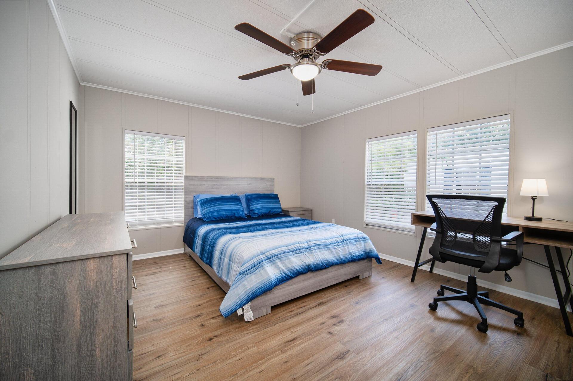 Queen size bed, with desk, chair, full closet, 2 dressers, nightstand and lamp