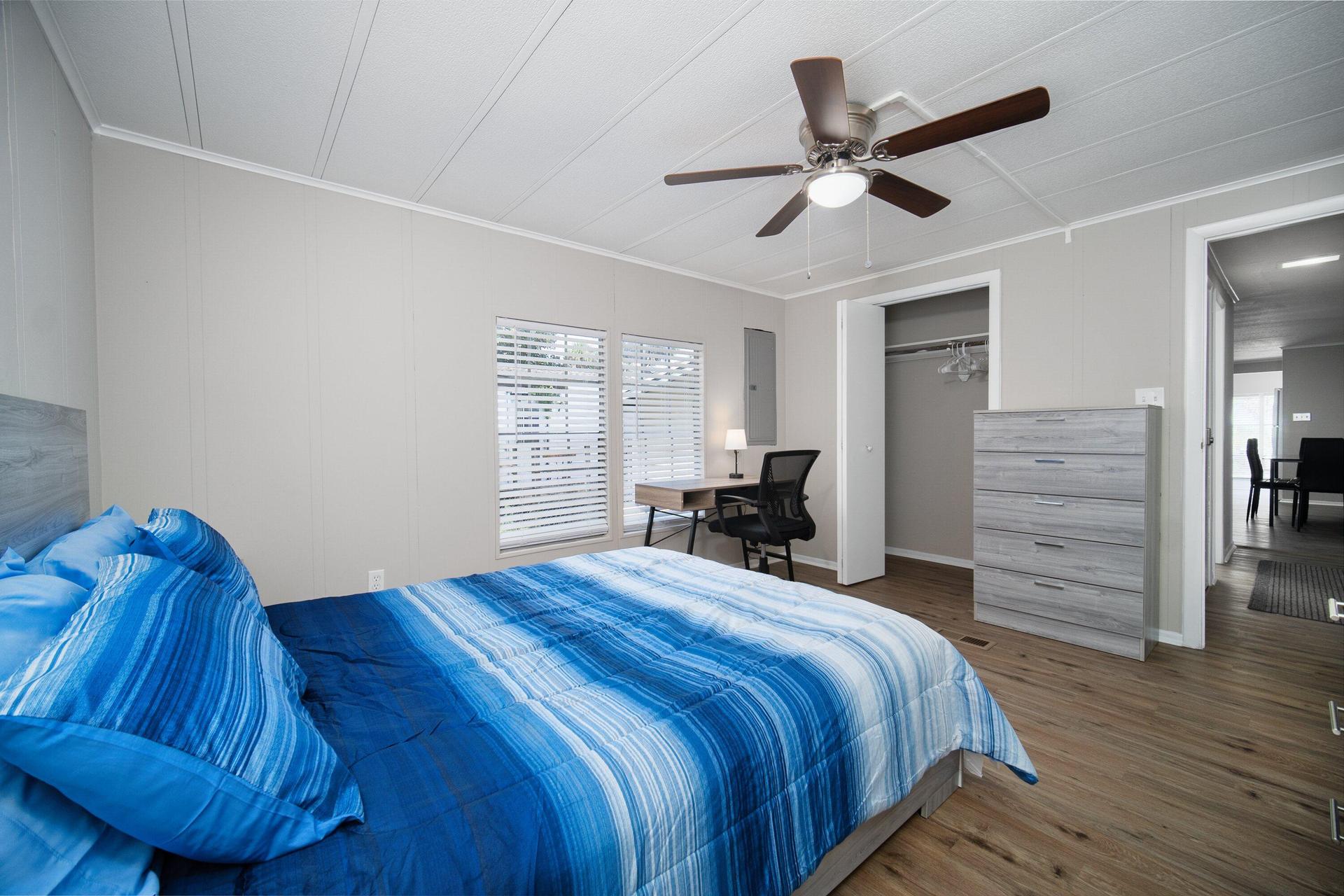 Queen size bed, with desk, chair, full closet, 2 dressers, nightstand and lamp