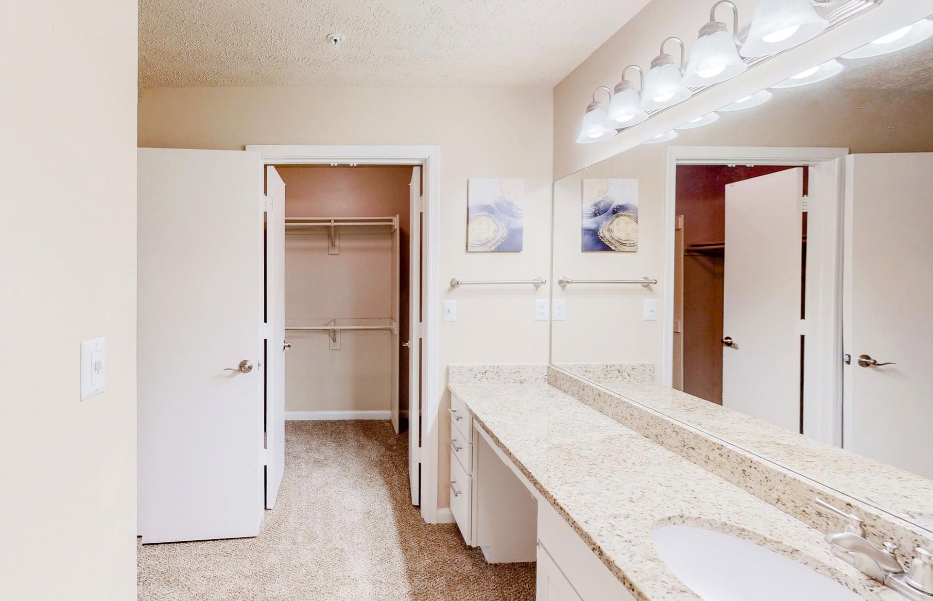 Spacious full private bathroom with tons of vanity space.