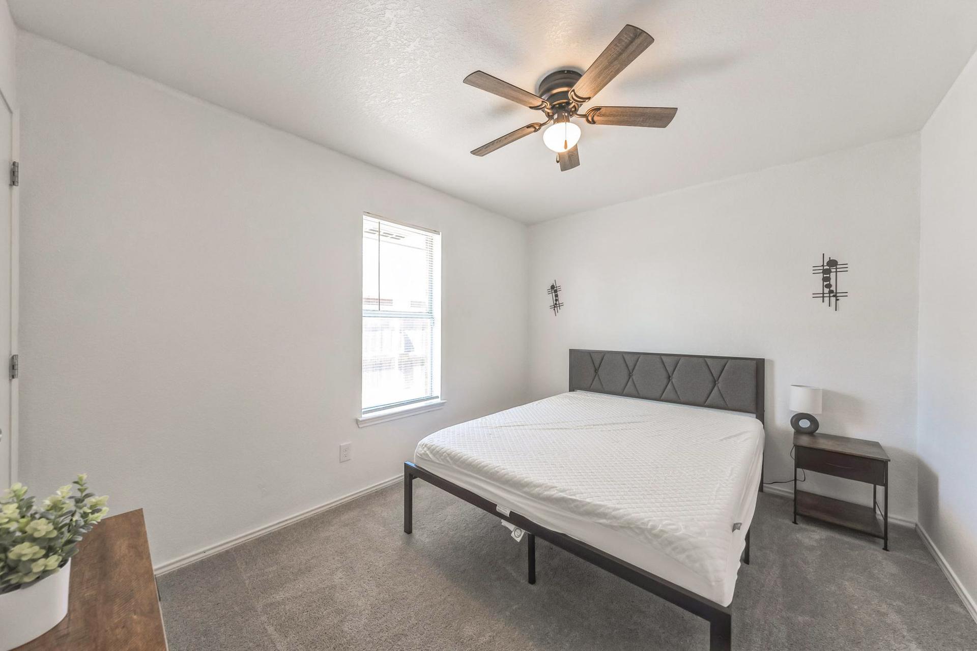 Queen size bed with nightstand & lamp