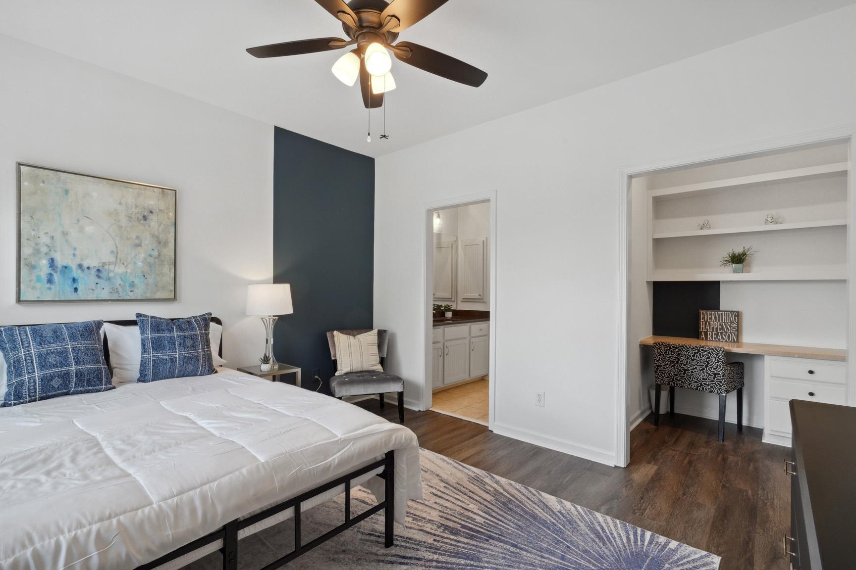 Another View of the Room Showing the Large Work Area, Lounge Chair and Private Vanity
