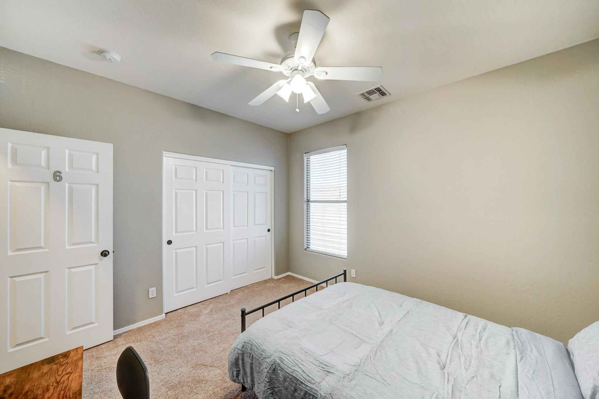 bedroom, detected:ceiling fan, window blind, bed