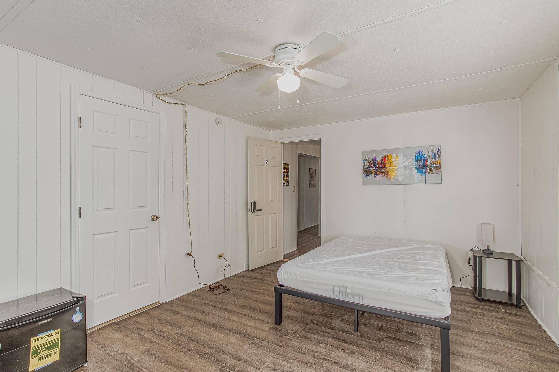 Large room, exits into kitchen