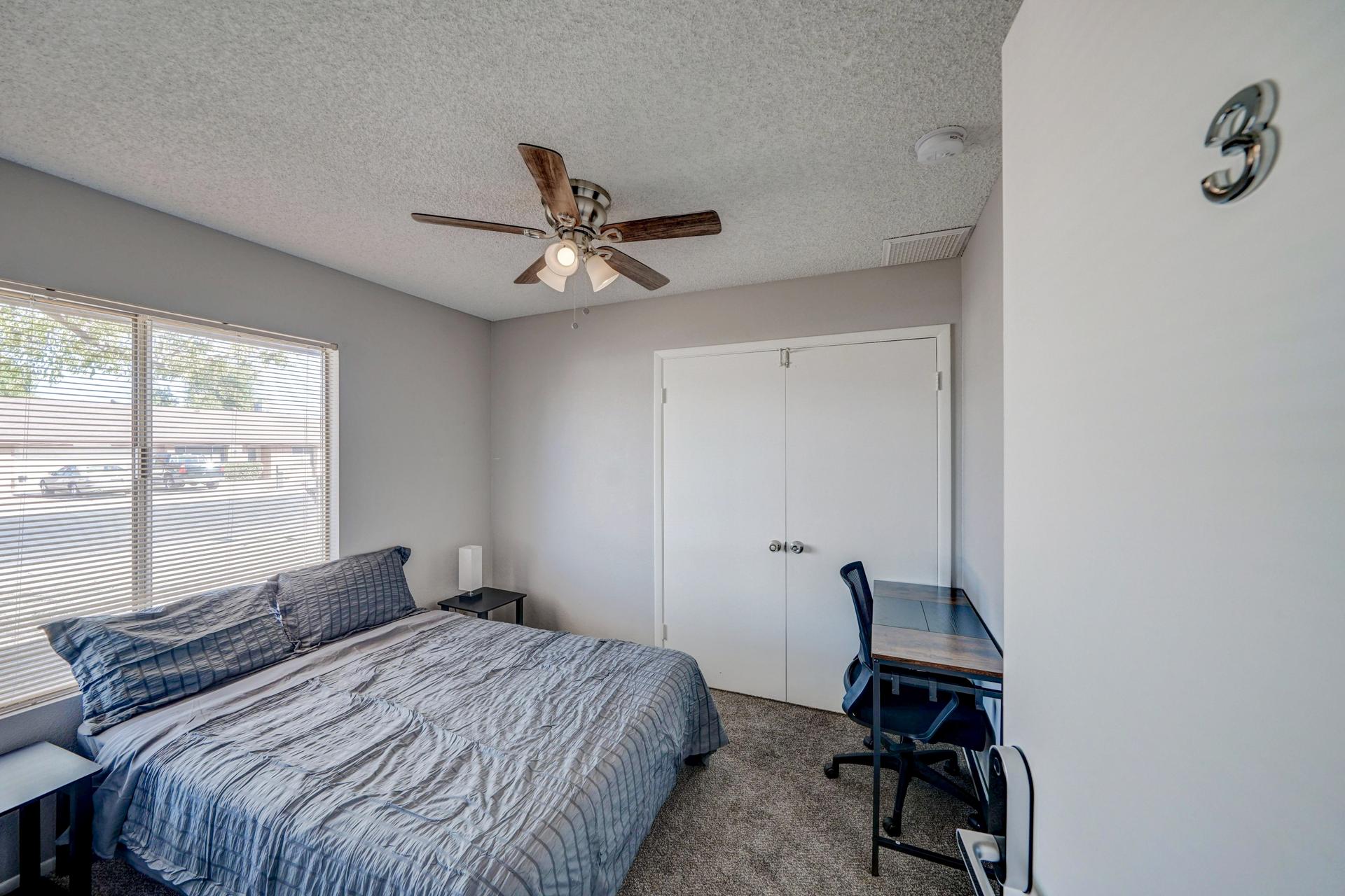 bedroom, detected:ceiling fan, window blind, bed