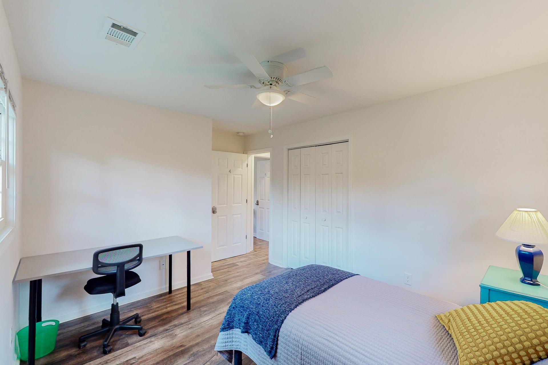 The room includes a full-size bed, not the smaller one pictured. Working or studying from home? We've got you covered!