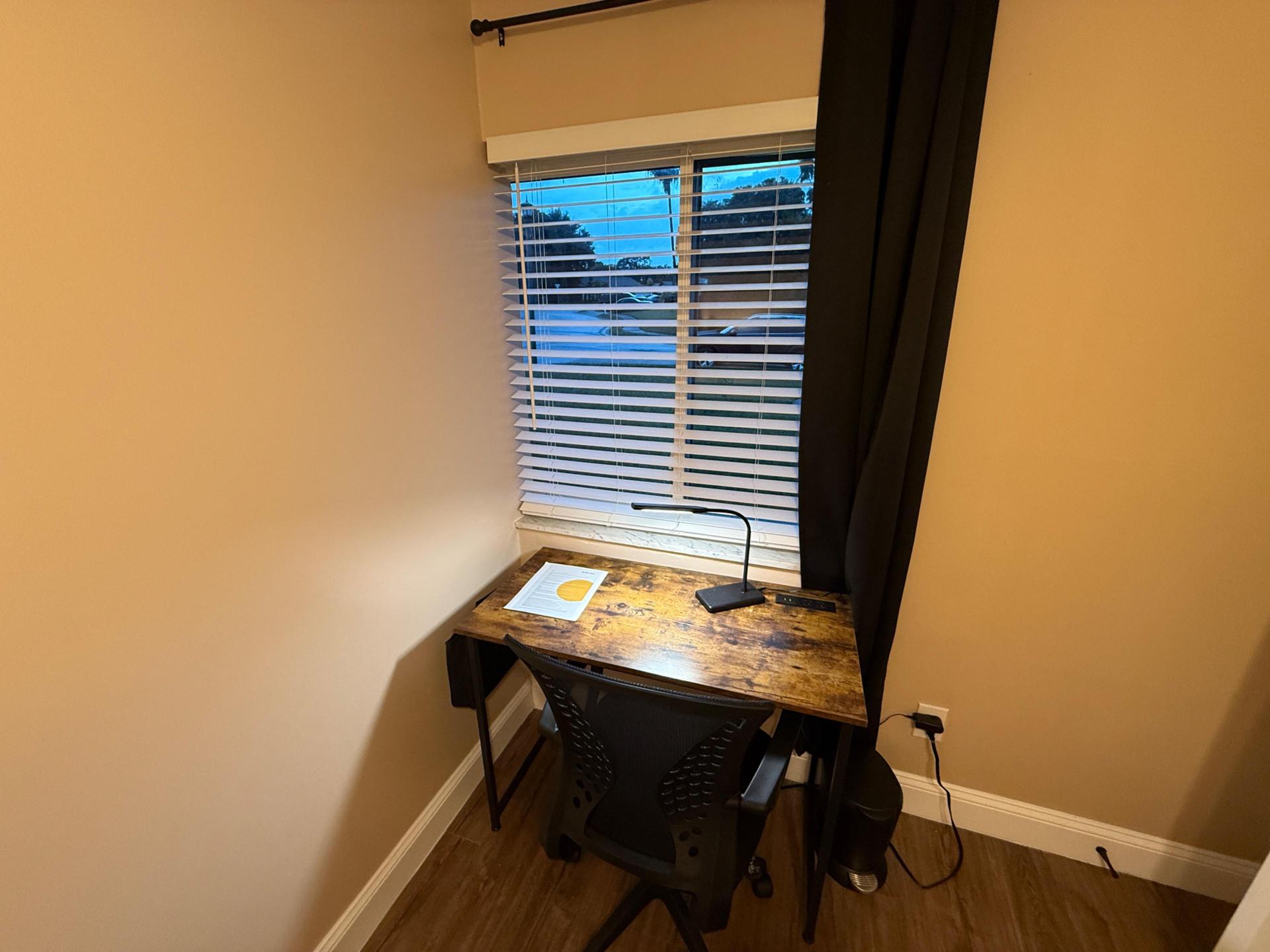 Desk with light and office chair