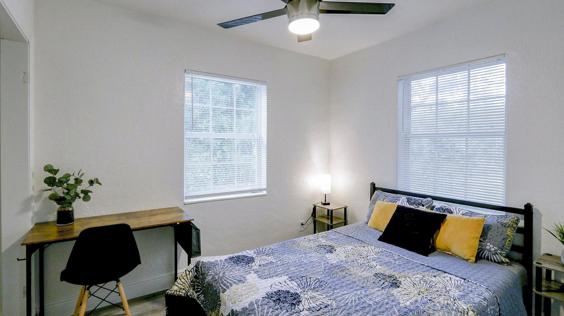 bedroom, detected:ceiling fan, window blind, bed