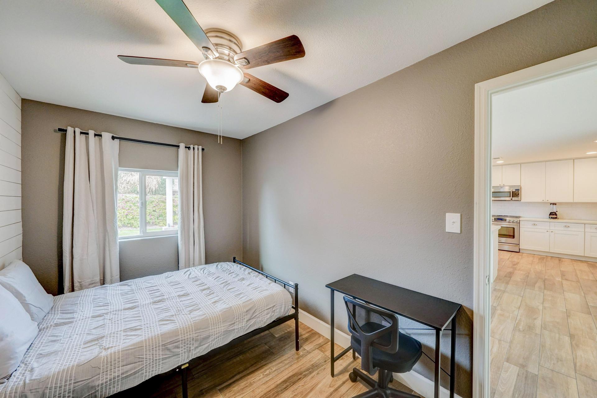 living_room, detected:ceiling fan, window blind