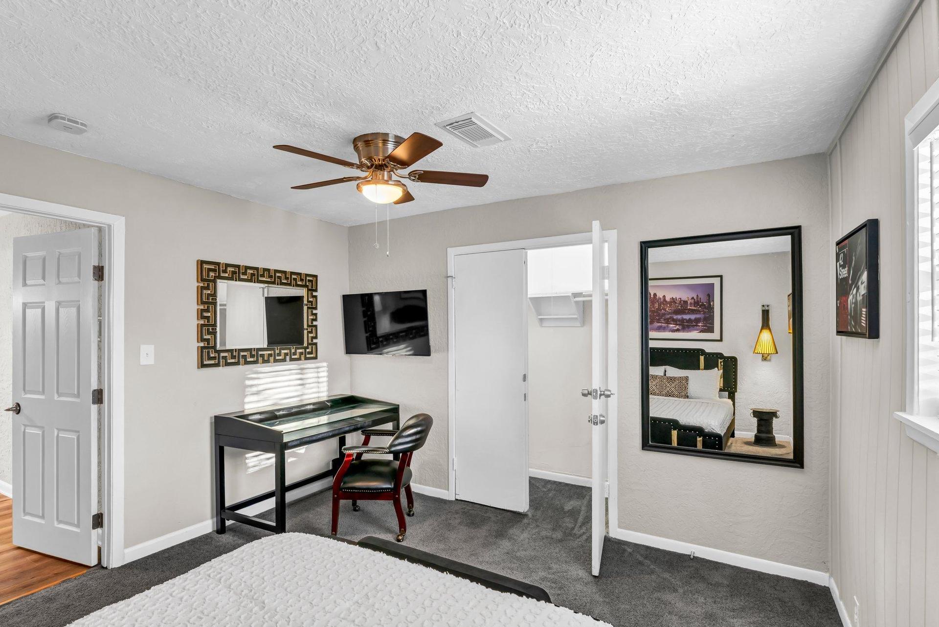 Full length closet & Spacious desk to hook up your electronics