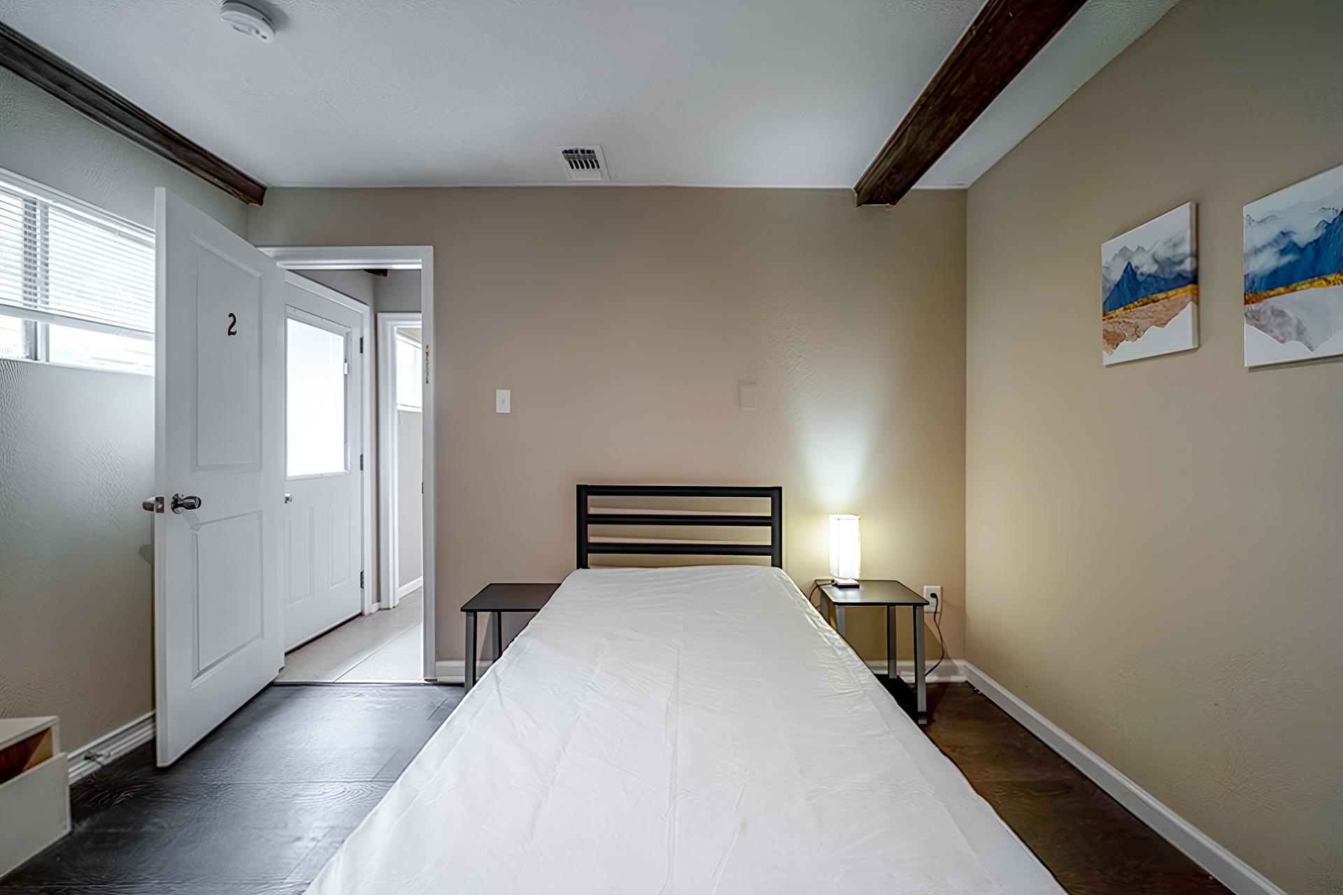 bedroom, detected: hardwood, window blind, bed