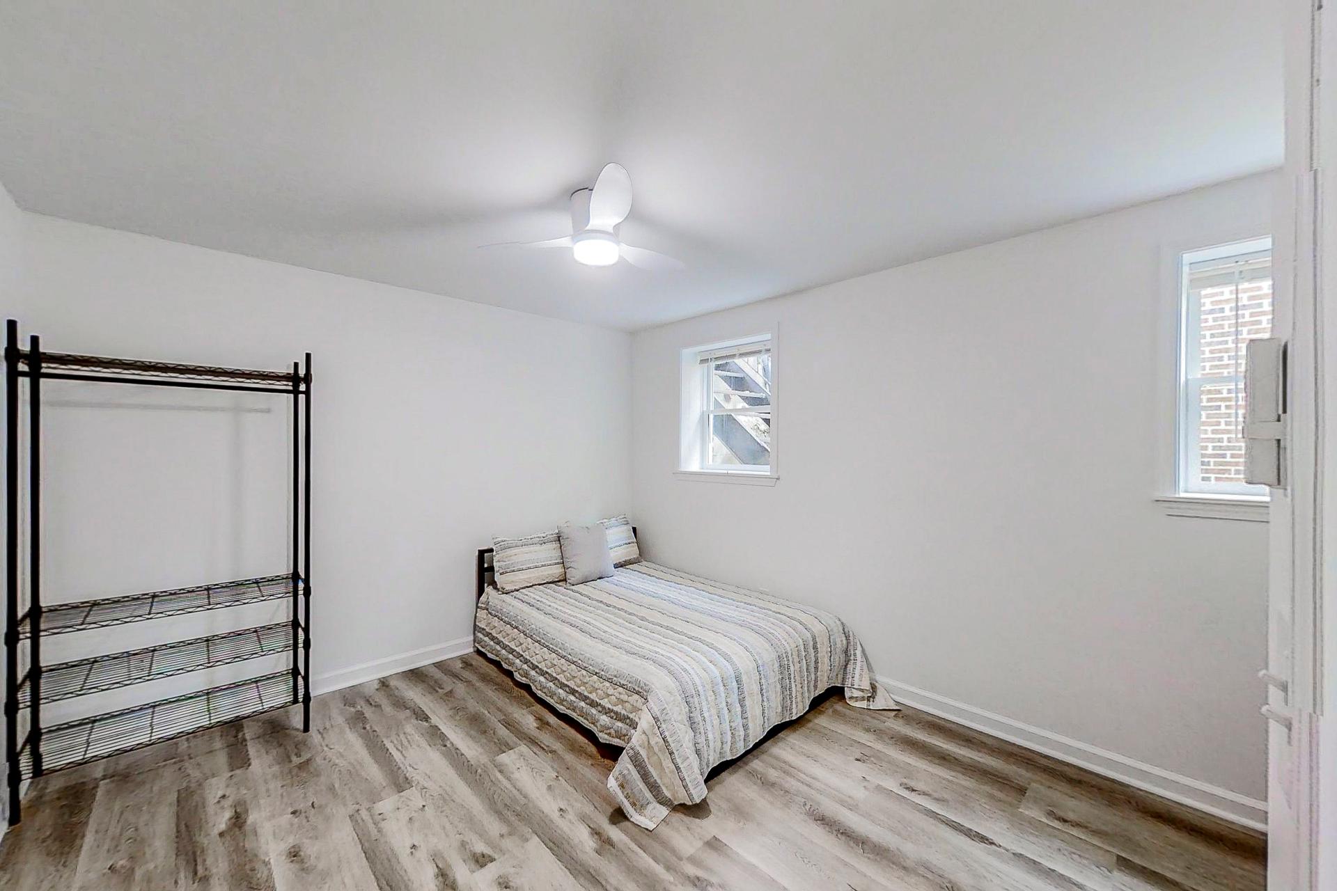 bedroom, detected:bed, window blind, ceiling fan