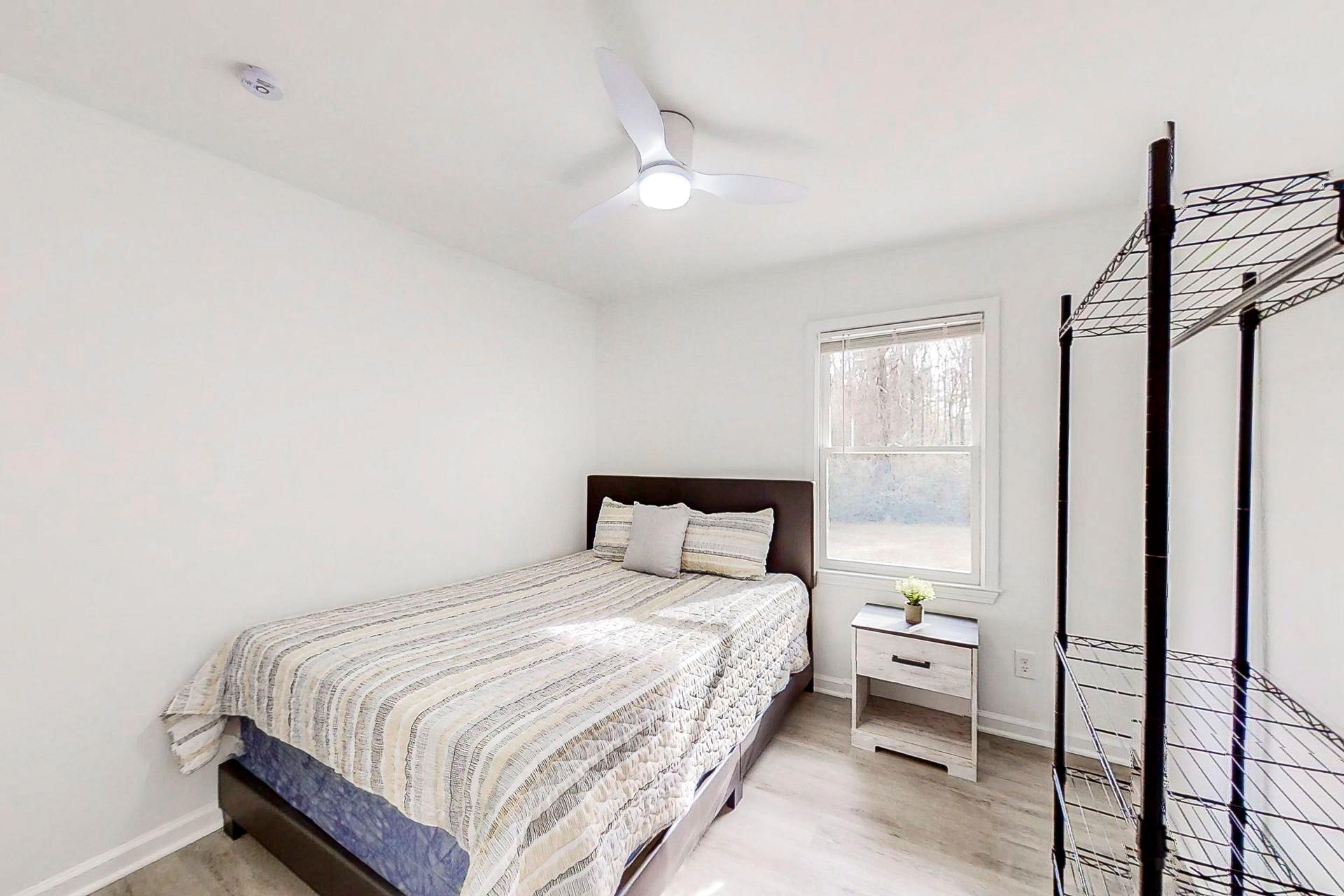 bedroom, detected:bed, ceiling fan, window blind