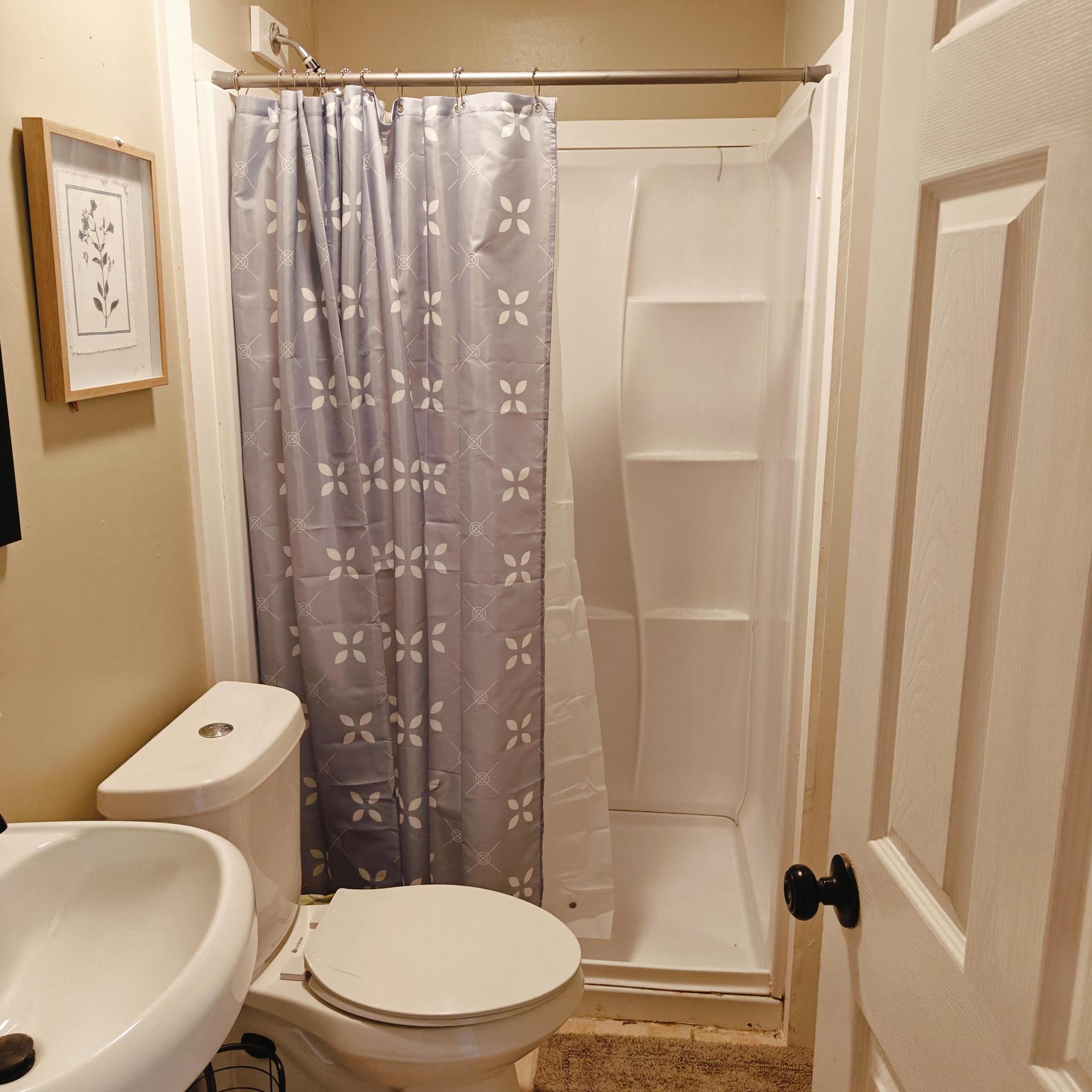 Full bathroom with shower.  Access to extra shared bathroom