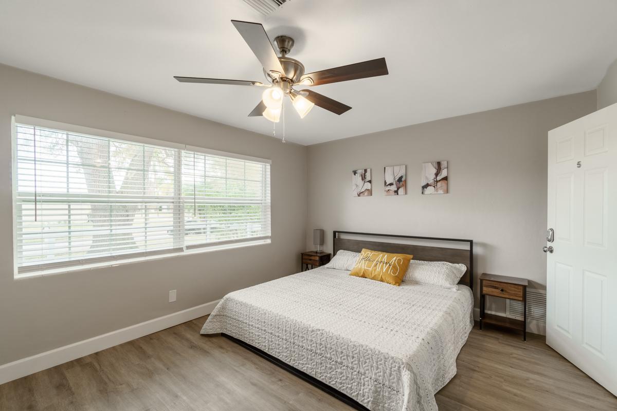 Room 5 - King Bed with Ceiling Fan and Bedside Tables