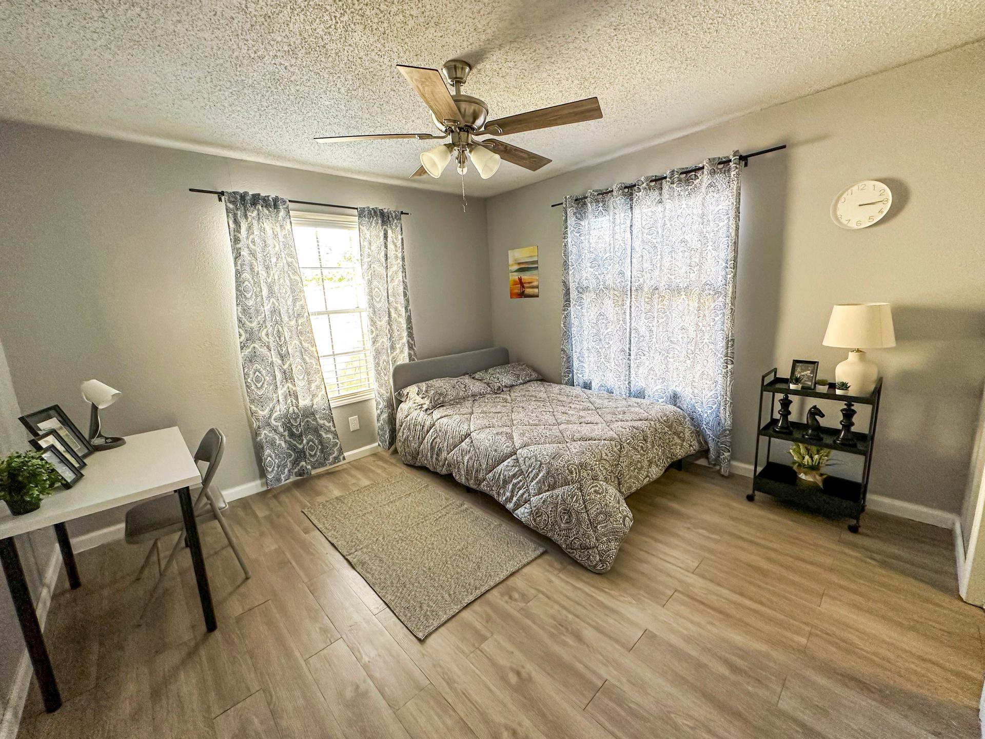 living_room, detected:ceiling fan, window blind