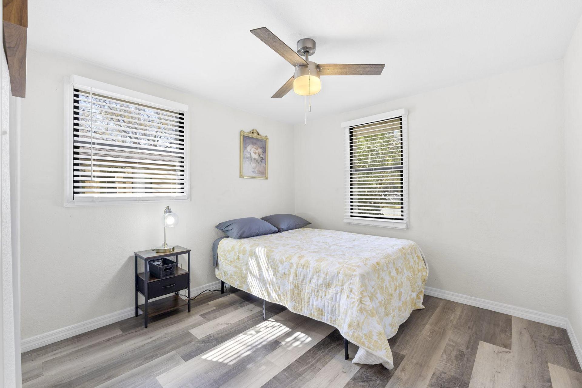 bedroom, detected:ceiling fan, window blind, bed