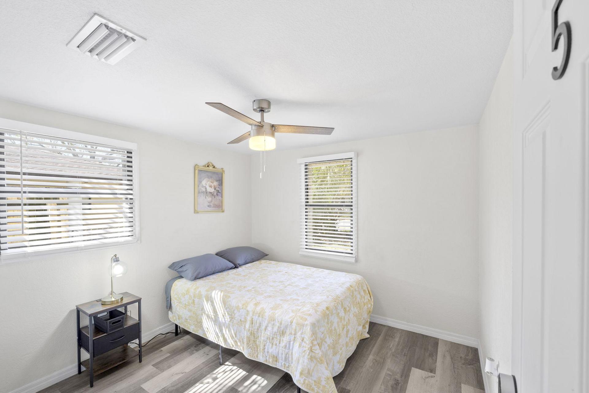 bedroom, detected:ceiling fan, window blind, bed