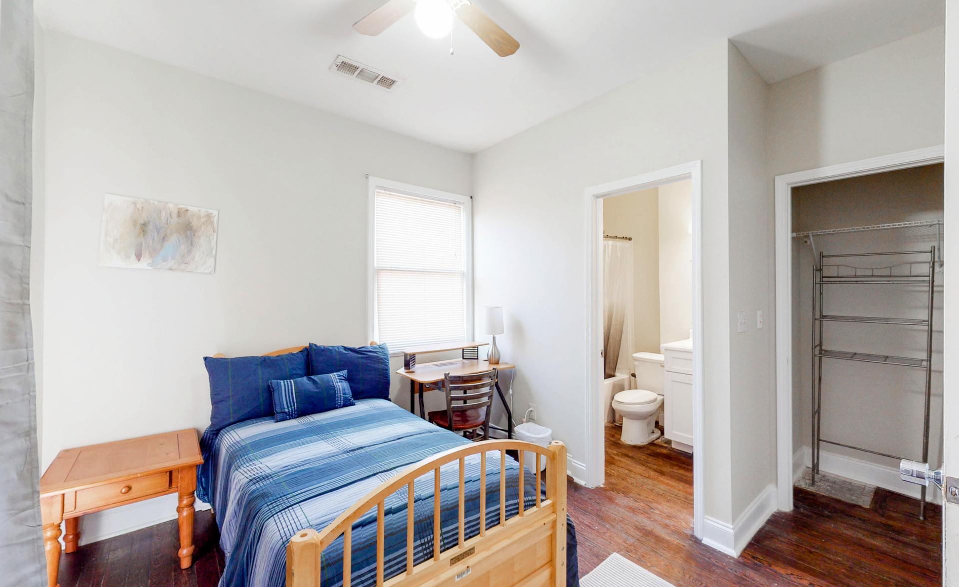 Bedroom  5 has a pine twin bed with ensuite bath, closet and additional storage. Bedroom 5 also has access to front balcony.