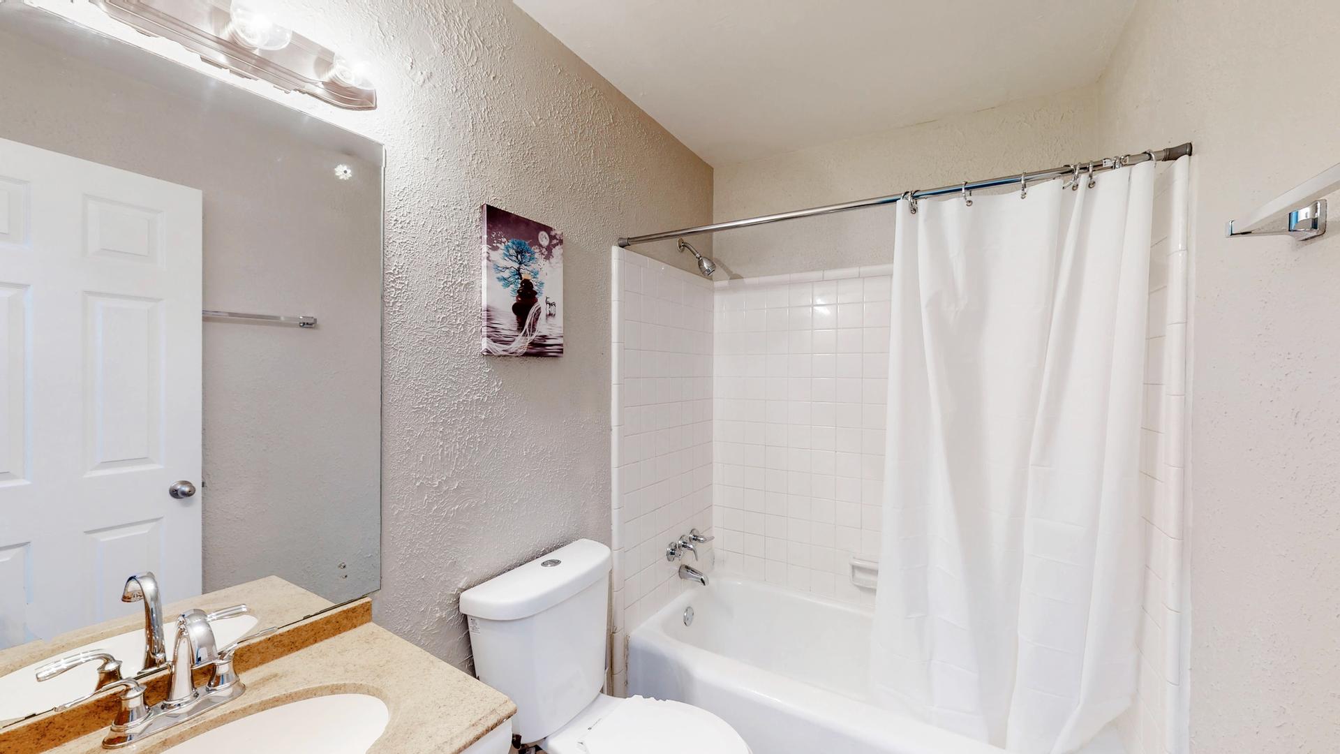 Shared upper level full bathroom.