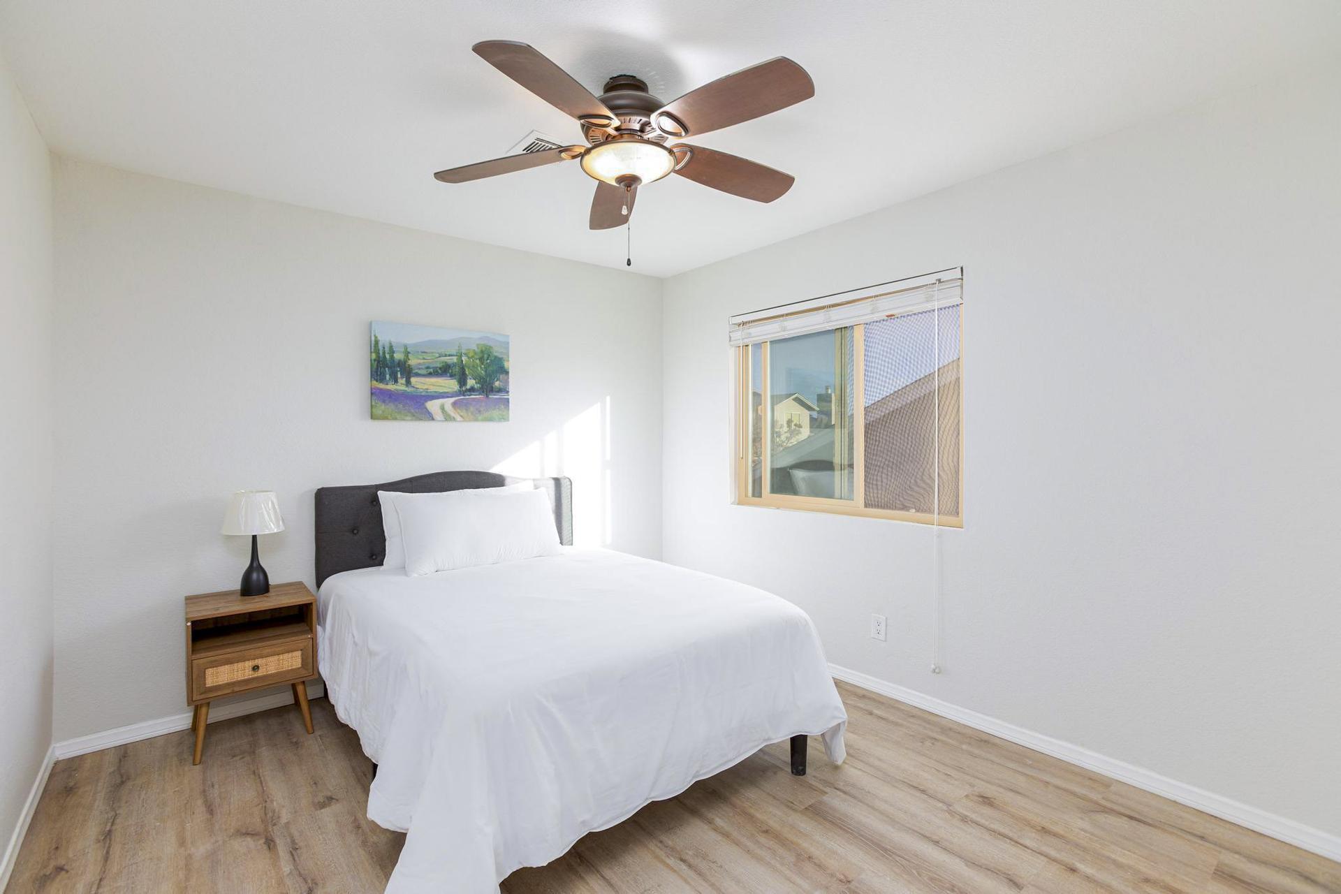 bedroom, detected:ceiling fan, window blind, bed
