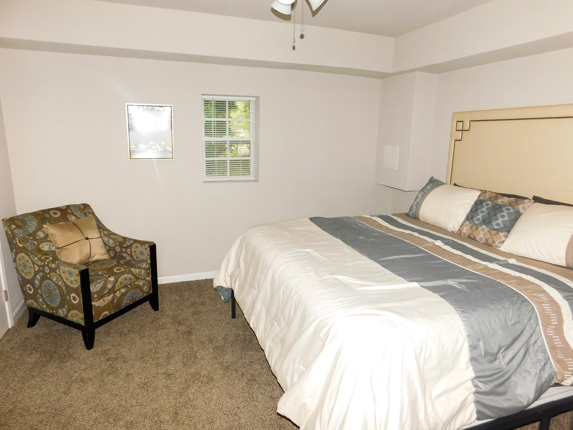bedroom, detected:bed, window blind, ceiling fan