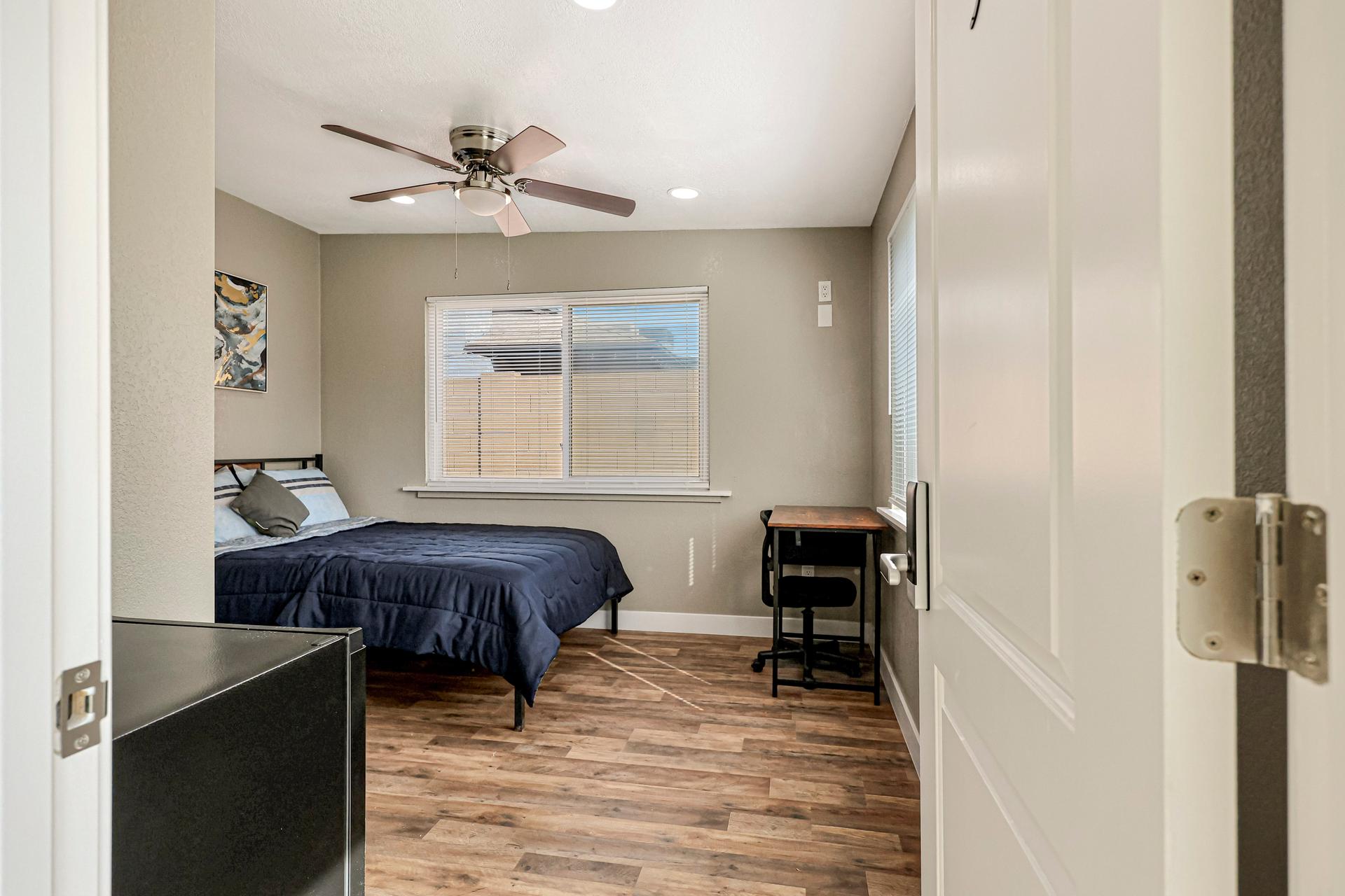 living_room, detected:ceiling fan, window blind