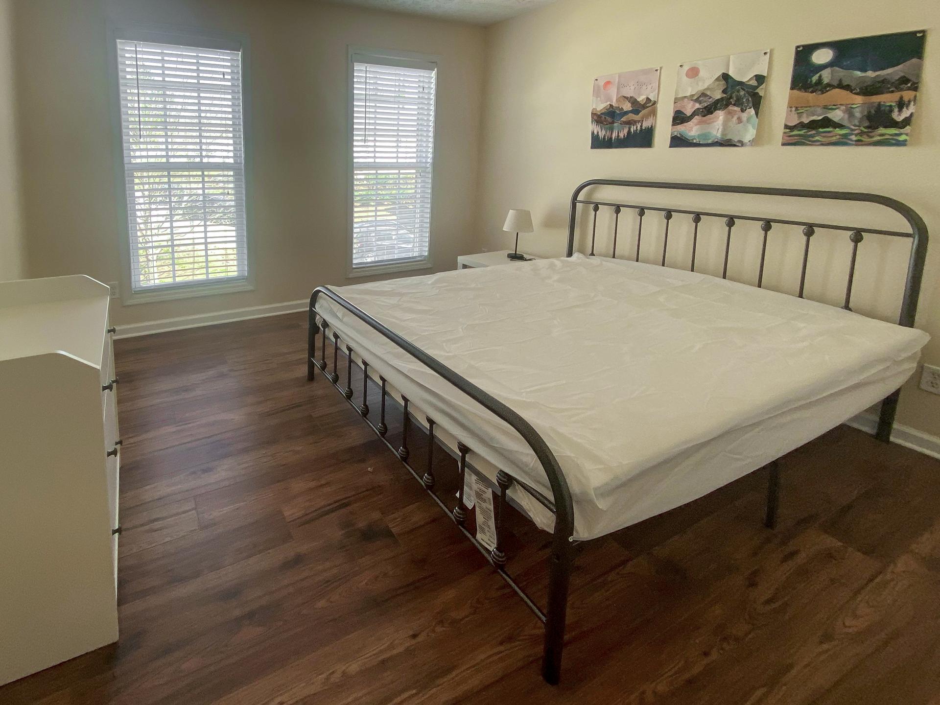 bedroom, detected: hardwood, window blind, bed