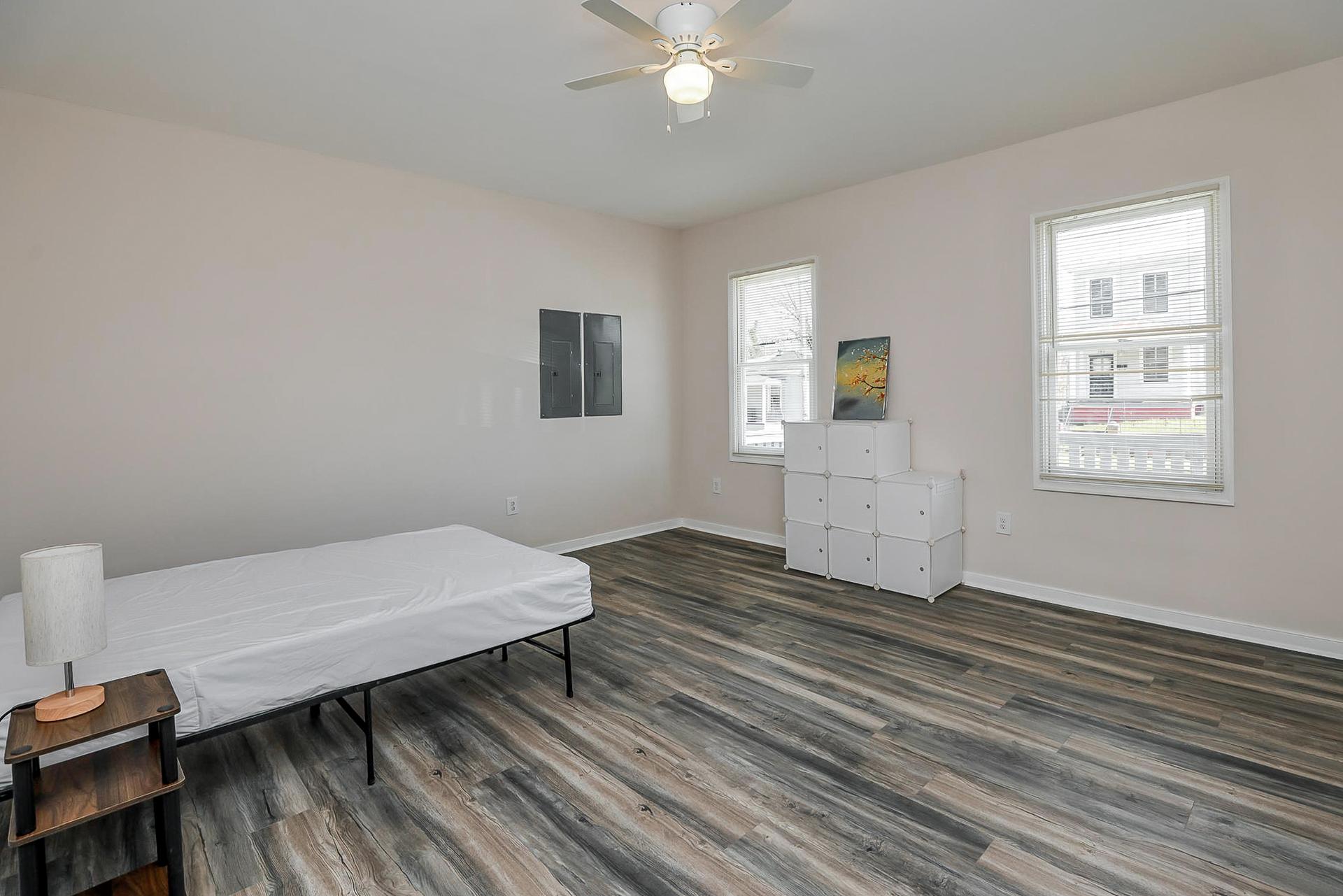 bedroom, detected: ceiling fan, hardwood, window blind