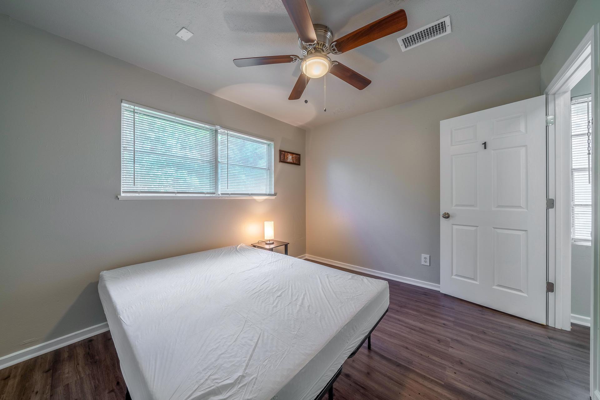bedroom, detected: ceiling fan, window blind, bed