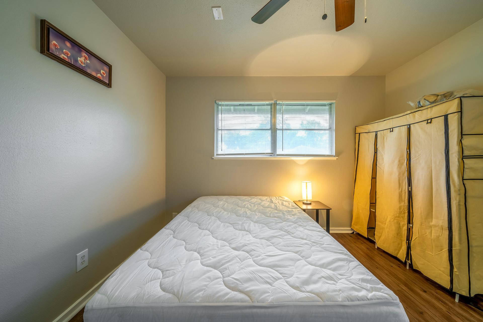 bedroom, detected: bed, ceiling fan, window blind