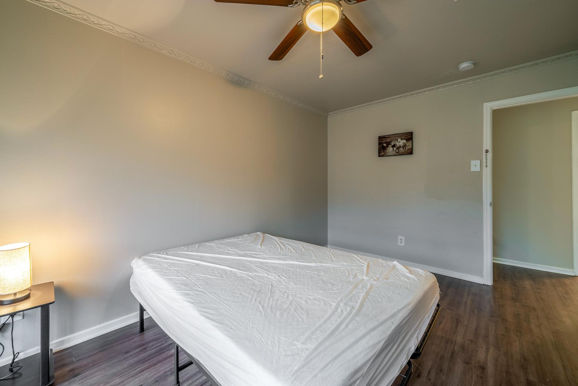 bedroom, detected: ceiling fan, window blind, bed