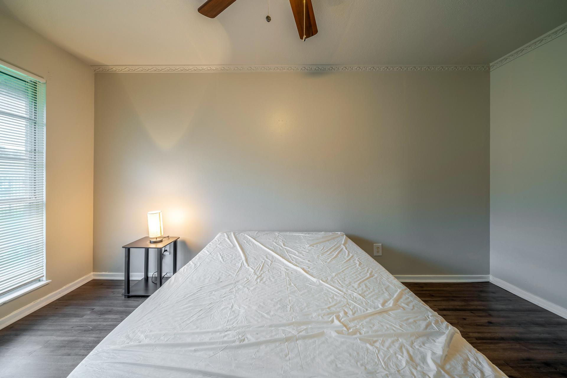 bedroom, detected: ceiling fan, window blind, bed