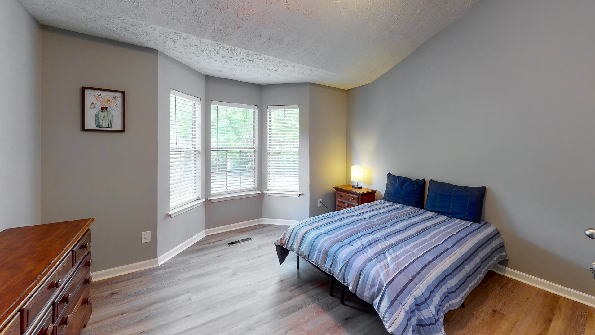 bedroom, detected: window blind, bed