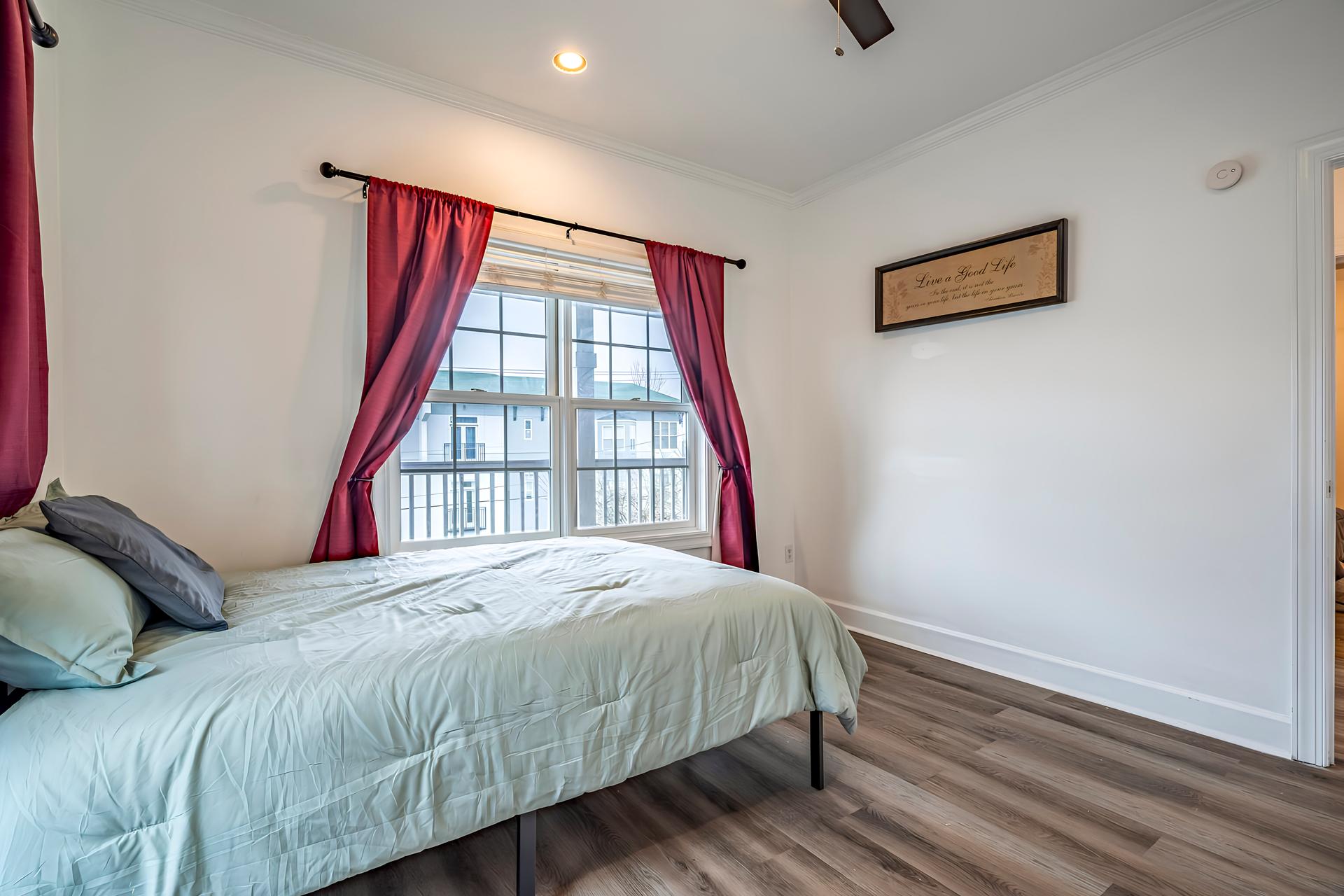 bedroom, detected:bed, ceiling fan, window blind