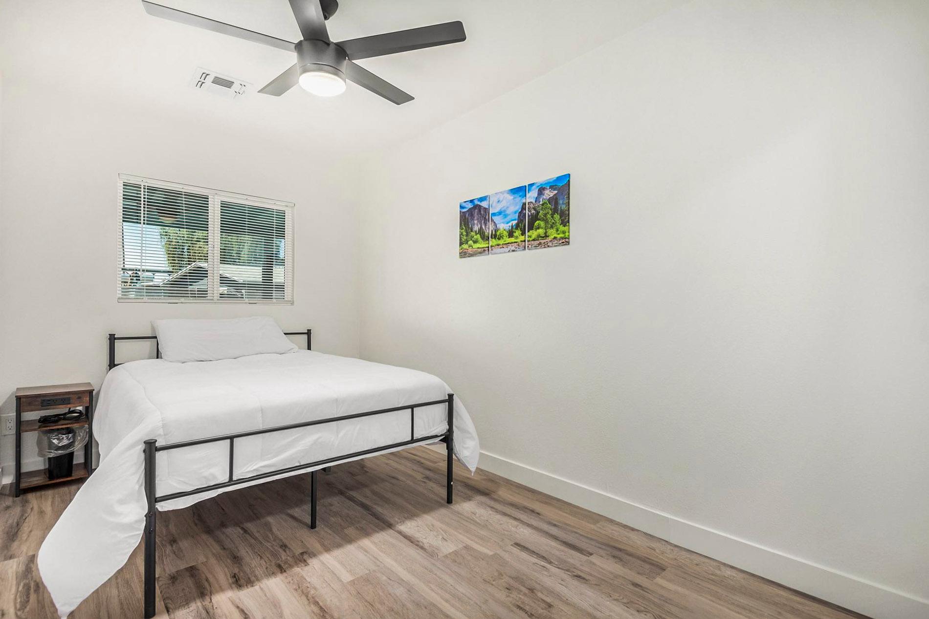bedroom, detected:ceiling fan, window blind, bed