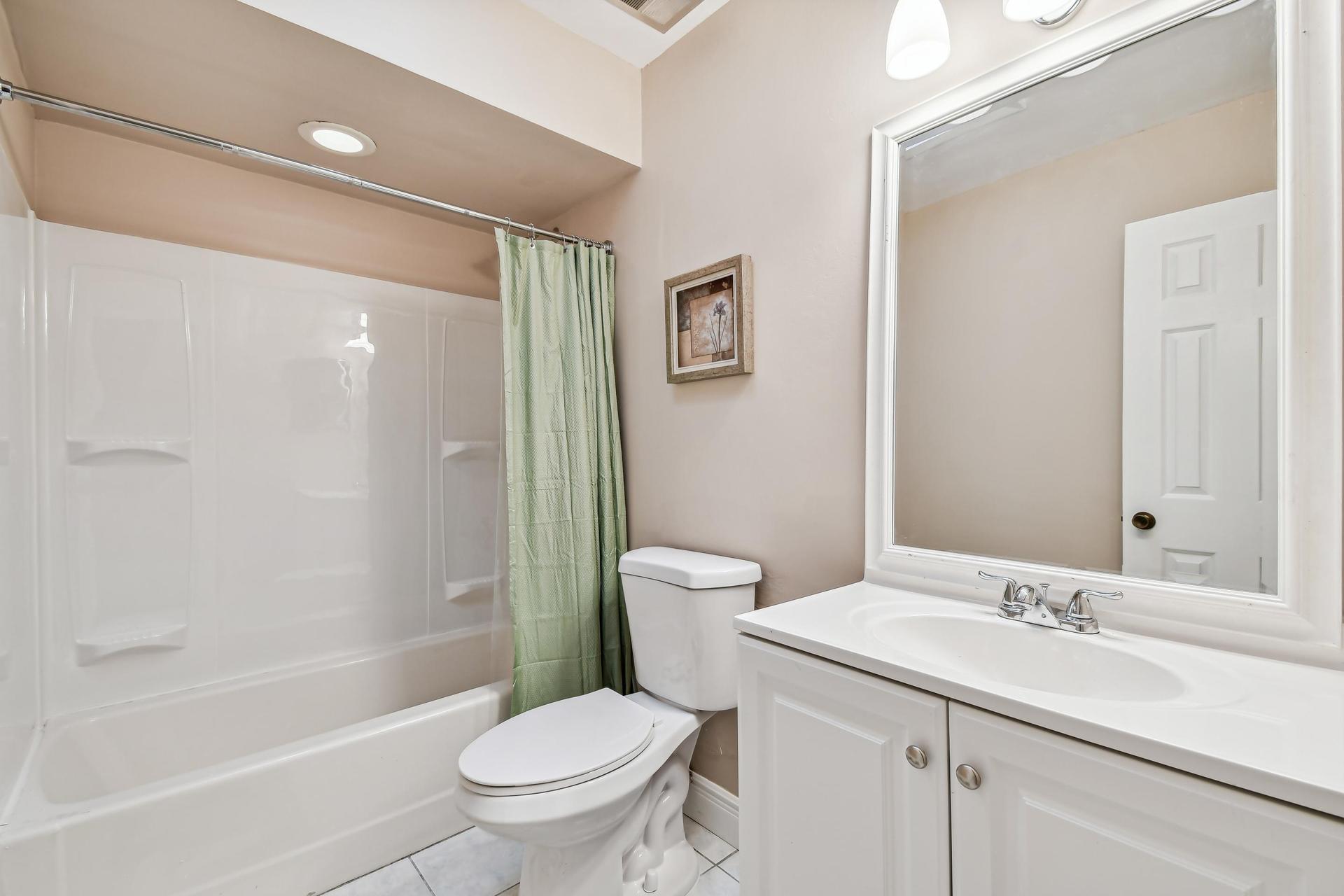 Updated bathroom with shower/tub.