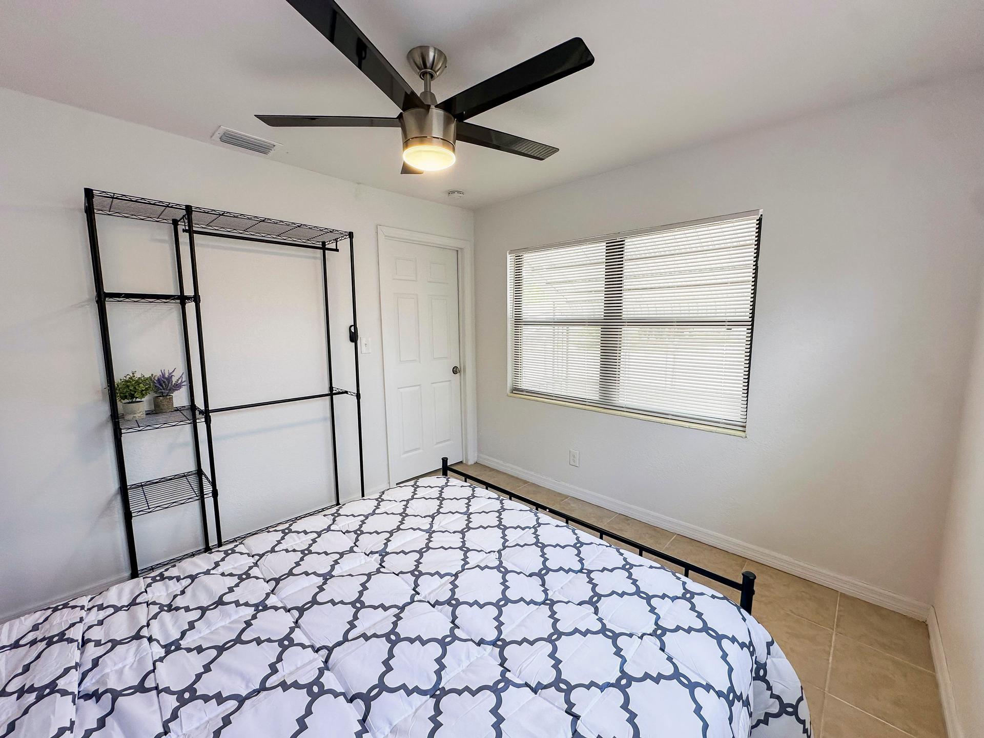 bedroom, detected:ceiling fan, window blind, bed