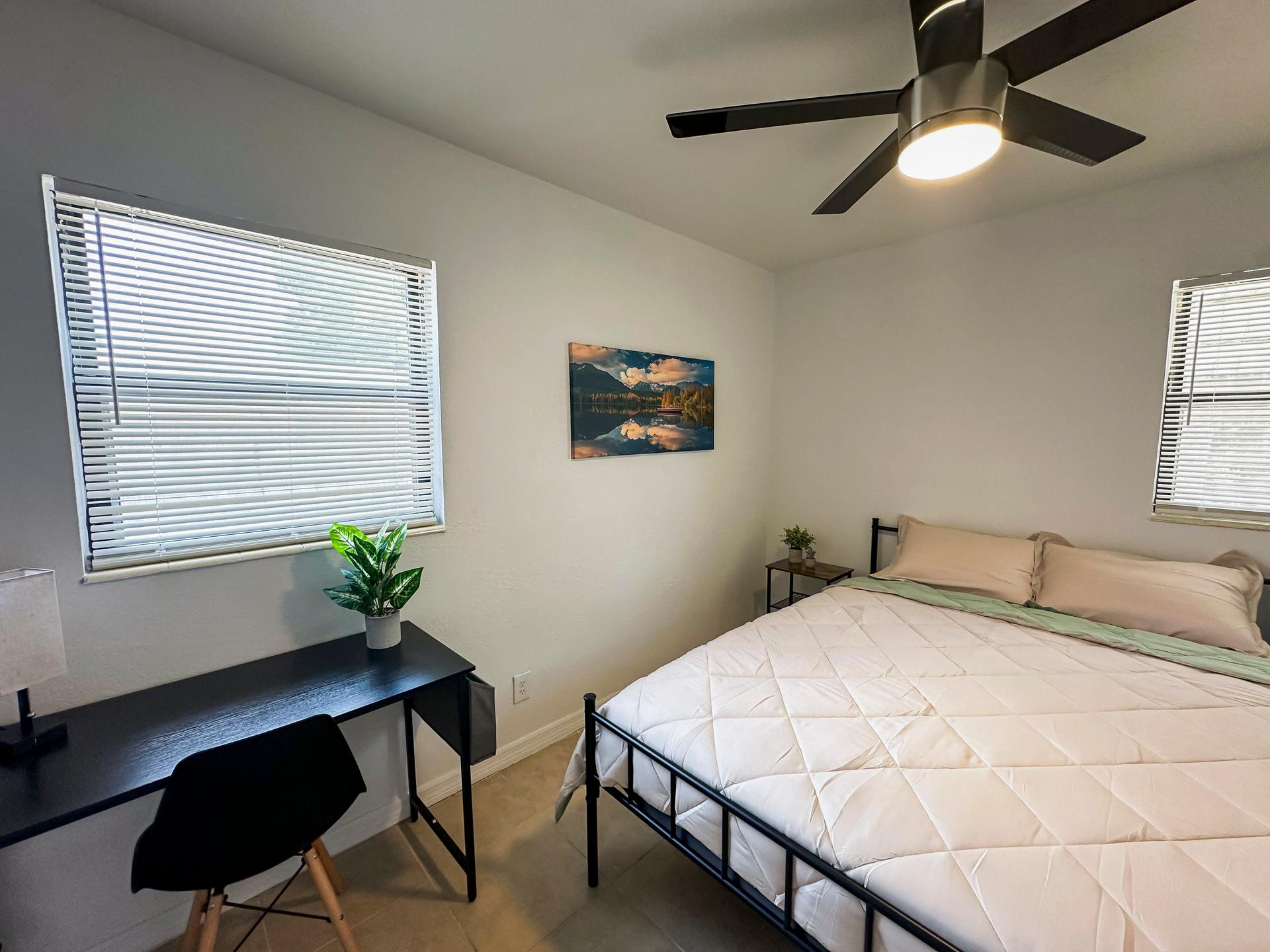 bedroom, detected:window blind, ceiling fan, bed