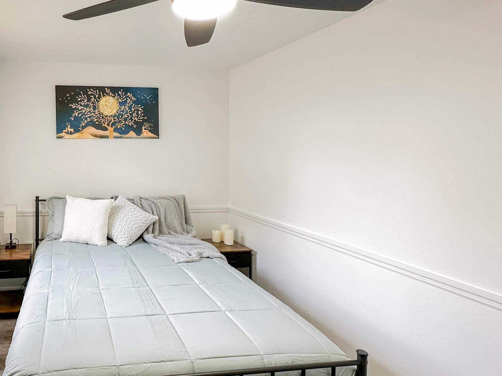 bedroom, detected:bed, window blind, ceiling fan