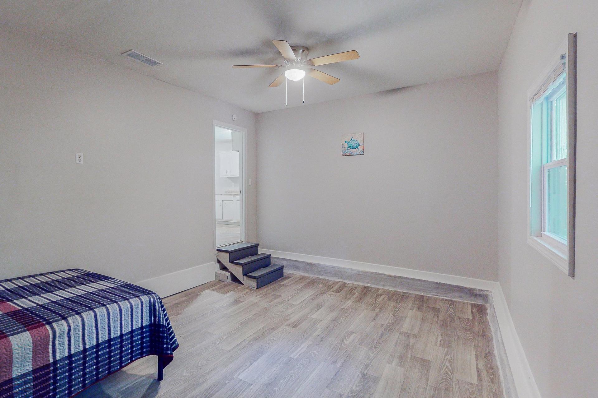 living_room, detected:ceiling fan, window blind