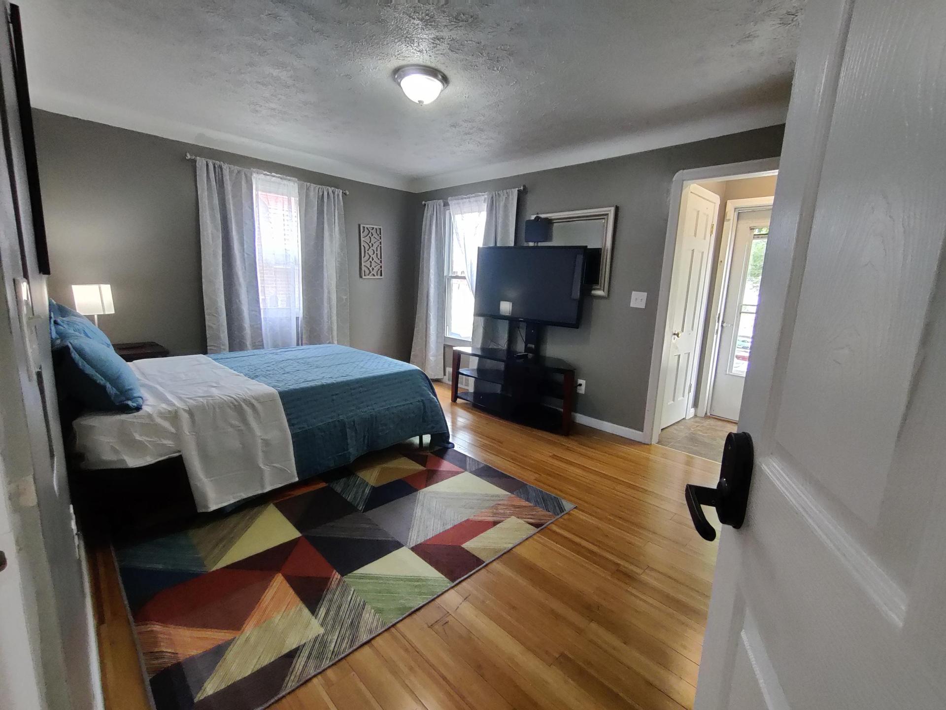 Bedroom 1 with TV