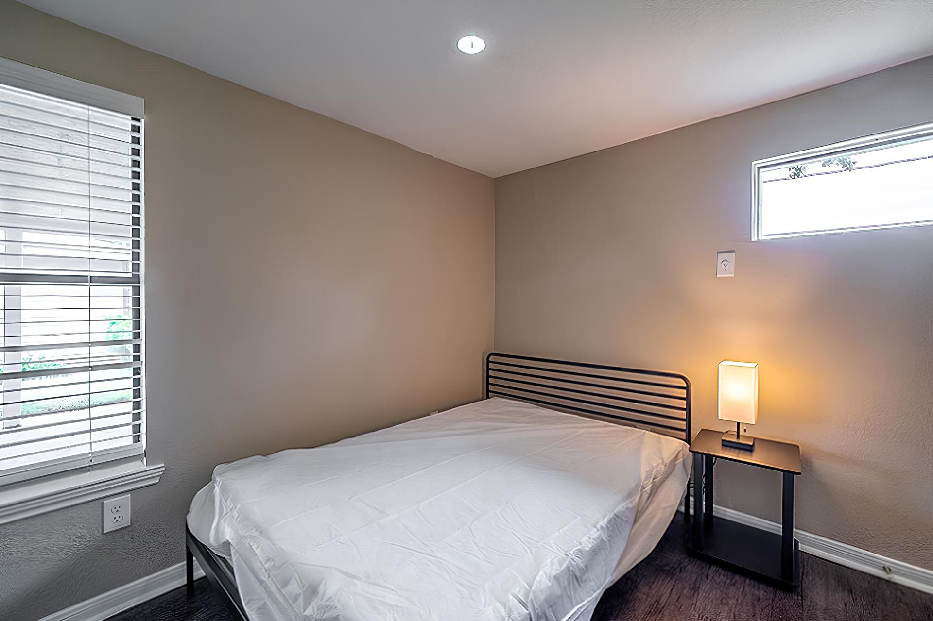 bedroom, detected: window blind, bed