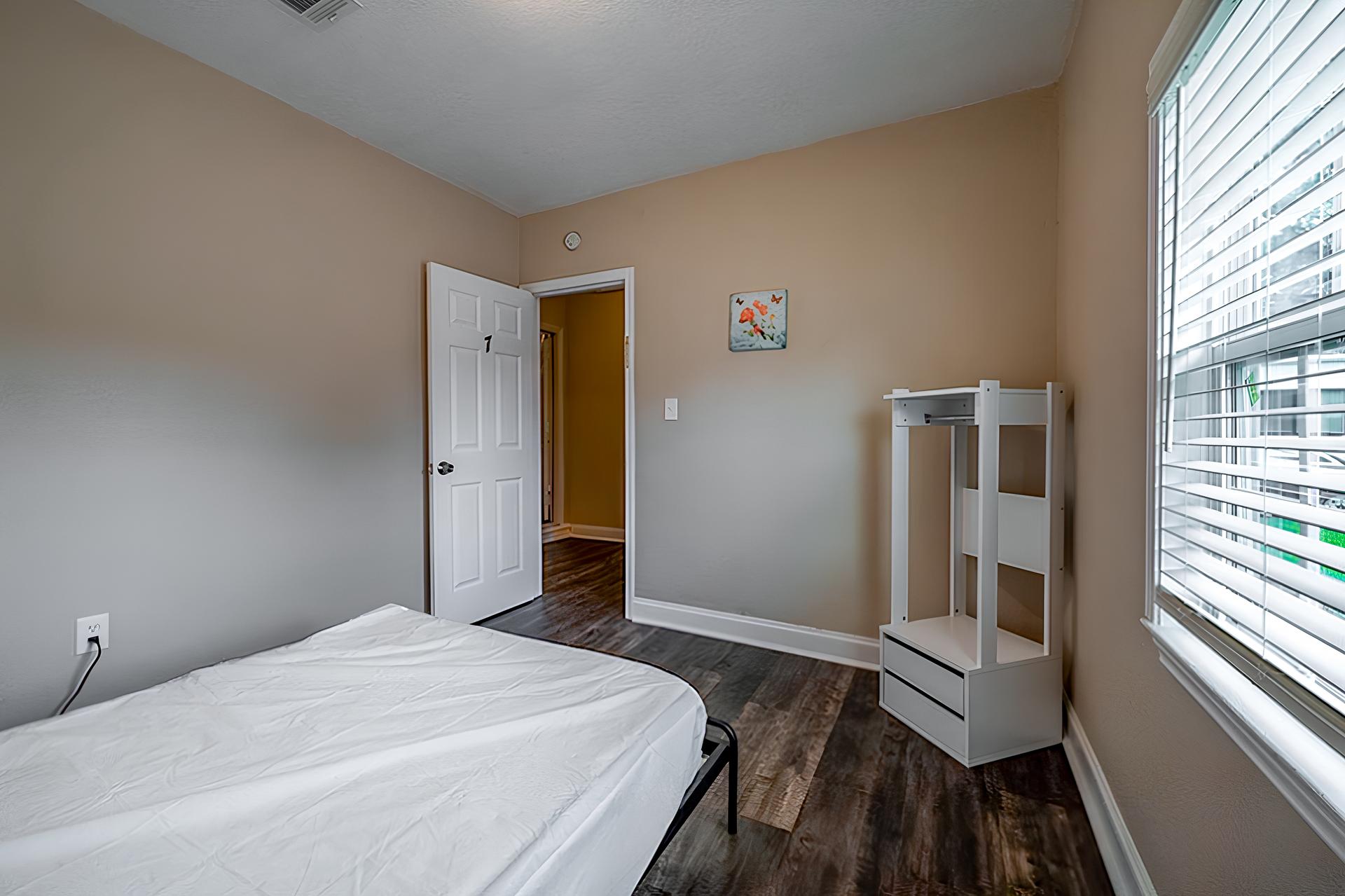 bedroom, detected: window blind, bed